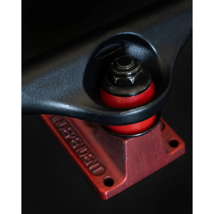 Close-up of a red and black mechanical component with 'KNUDSEN' branding.