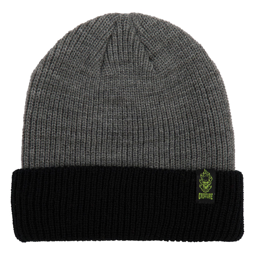 Gray beanie with black cuff and brand logo on a white background