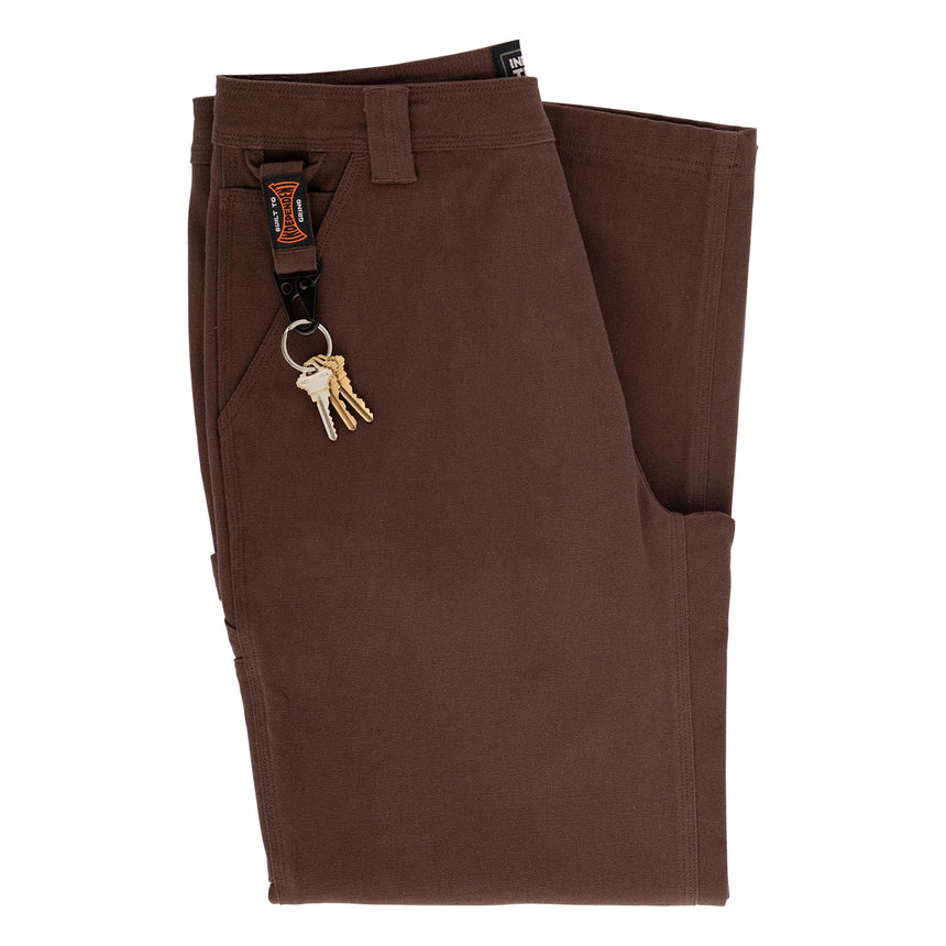 Brown pants with a keychain attached on a white background