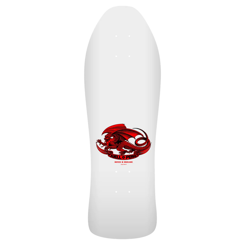 Gold pendant with a pink gemstone on a light beige background