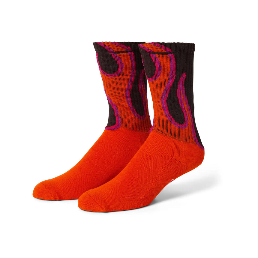 Pair of red socks with flame design on a white background