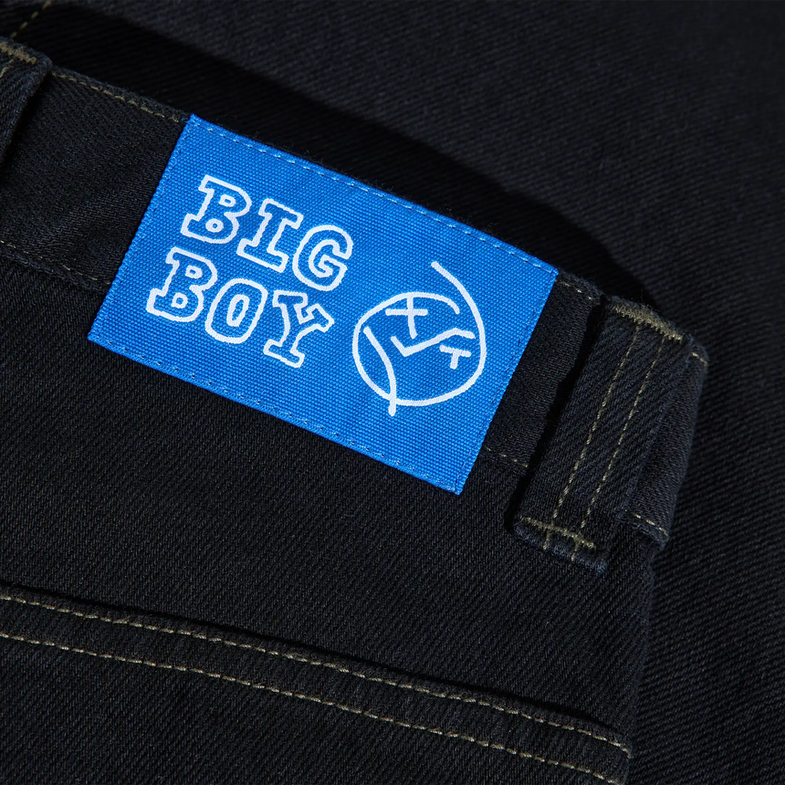 Blue label with 'BIG BOY' text on a black fabric background