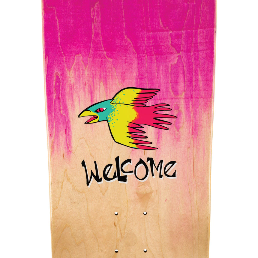 Skateboard deck with a colorful bird graphic and 'Welcome' text on a pink and beige background