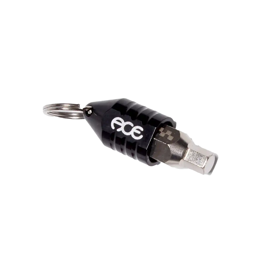 Black and silver tool with a keychain on a white background