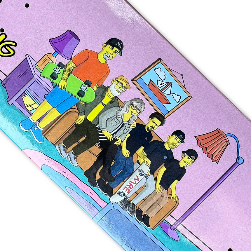 Colorful skateboard deck with cartoon-style illustration of people on a couch.