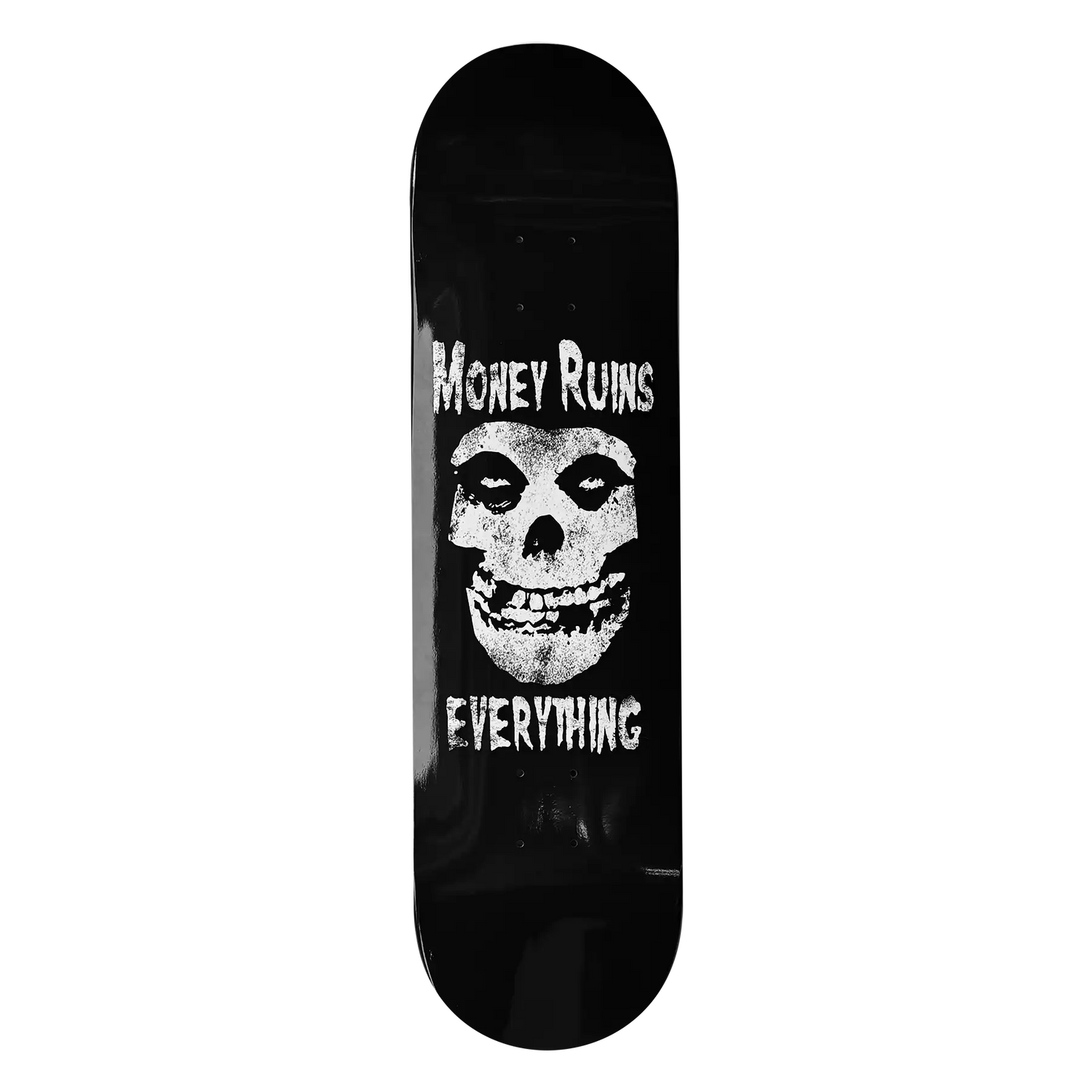 Skateboard deck with skull design and text 'Money Ruins Everything' on a black background