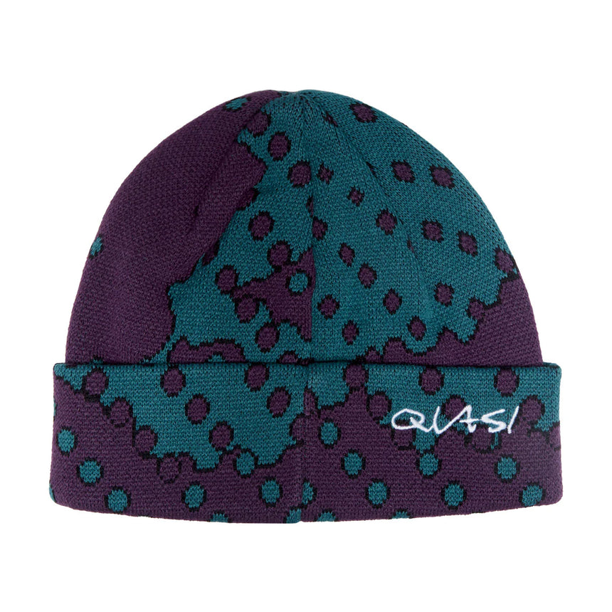 Purple and teal patterned beanie with 'Quasi' branding on a white background