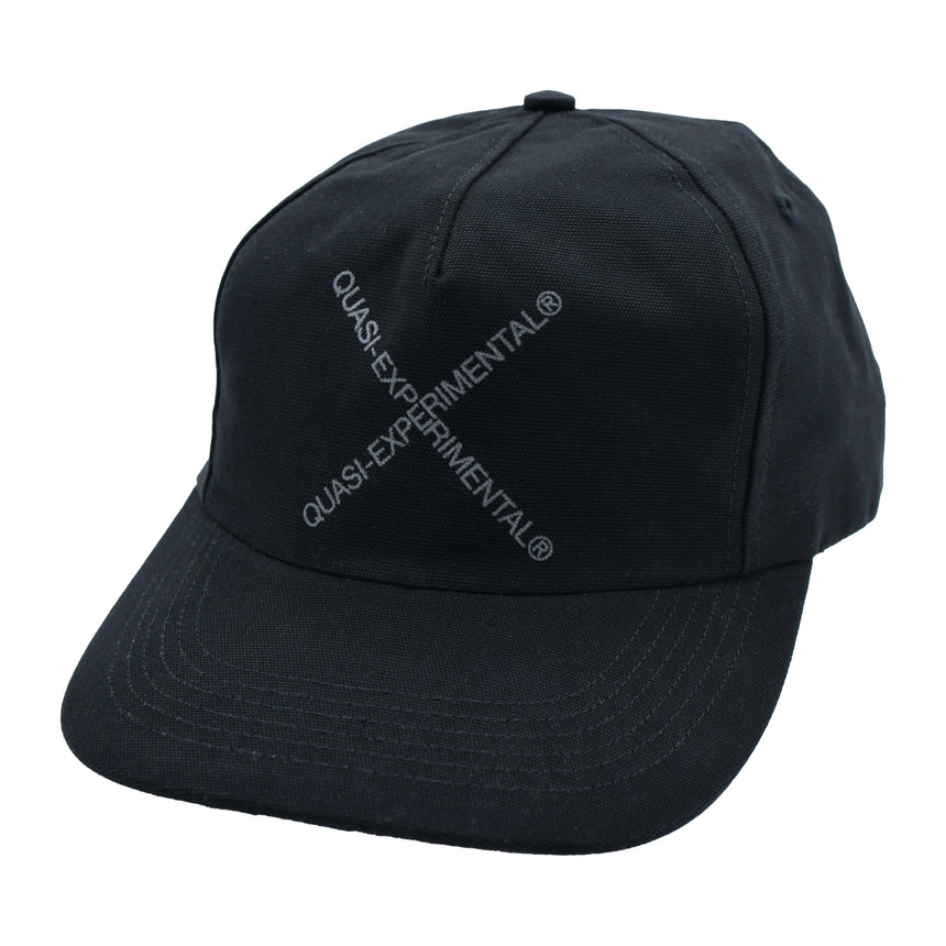 Black cap with 'Quasi-Experimental' logo on a white background