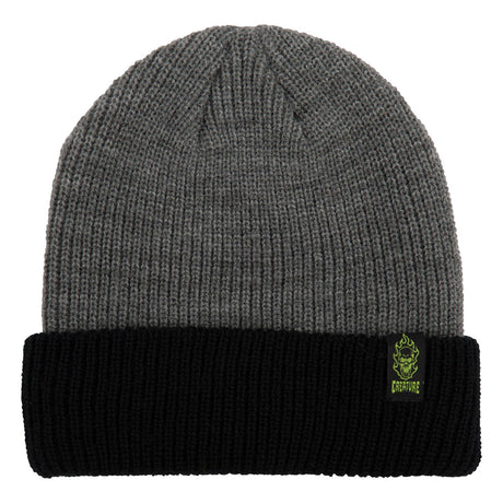 Gray beanie with black cuff and brand logo on a white background