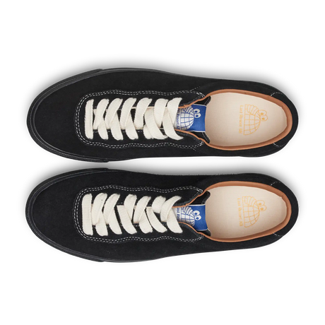 Black sneakers with white laces on a white background