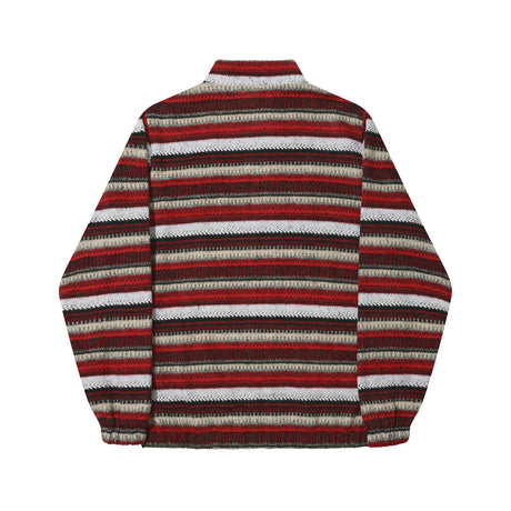 Striped sweater with red, brown, and white pattern on a white background