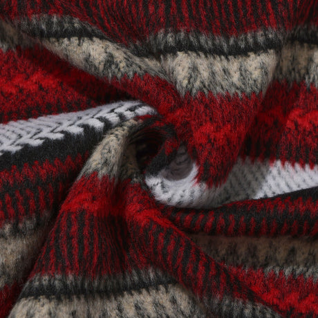 Close-up of a knitted fabric with red, gray, and black pattern