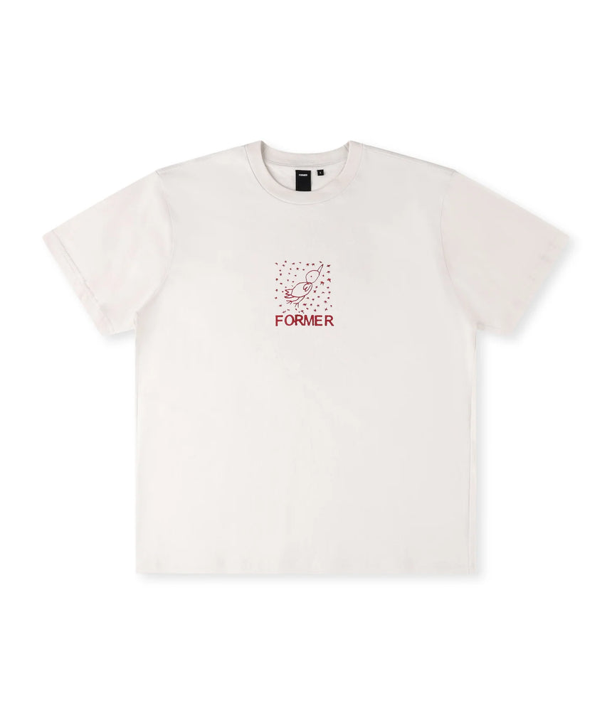 White t-shirt with red graphic design and text on a white background