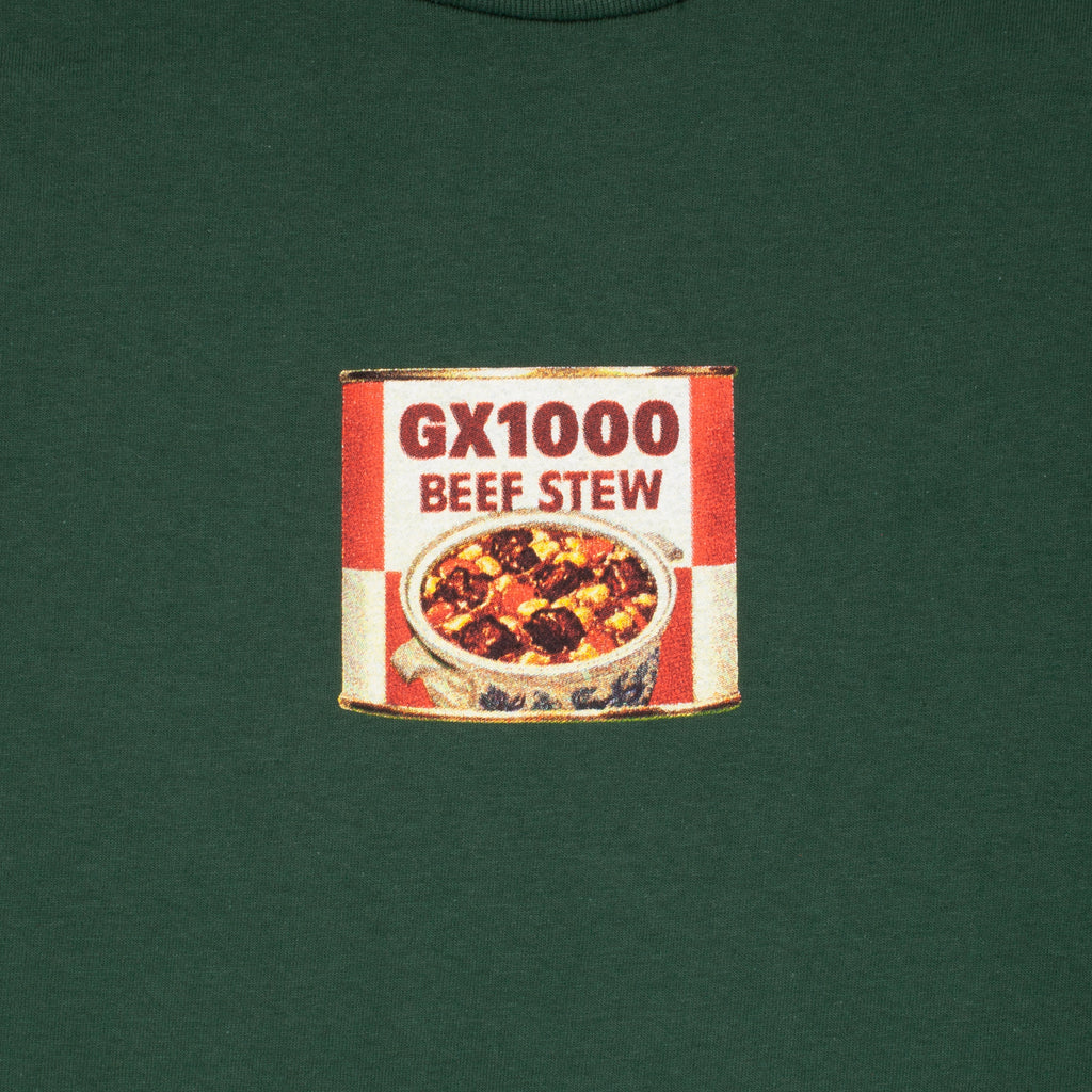 Vintage-style can of GX1000 Beef Stew on a green background