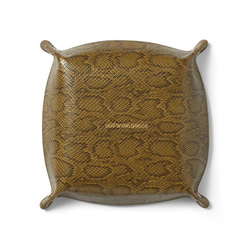 Decorative brown travel catchall with 'Hof World Wide' branding on a white background