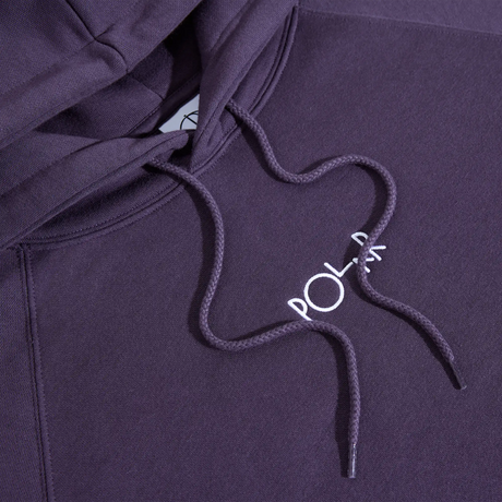 Close-up of a purple hoodie with a brand logo on the drawstring.