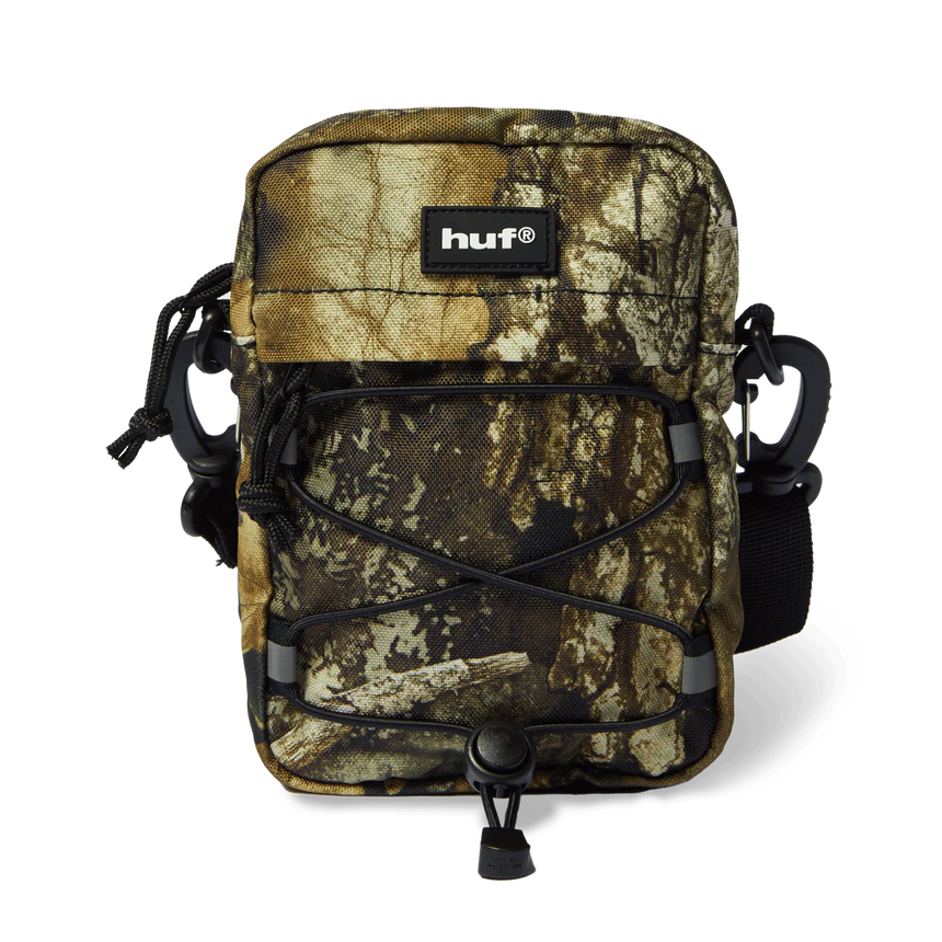Camouflage bag with 'huf' logo on a white background
