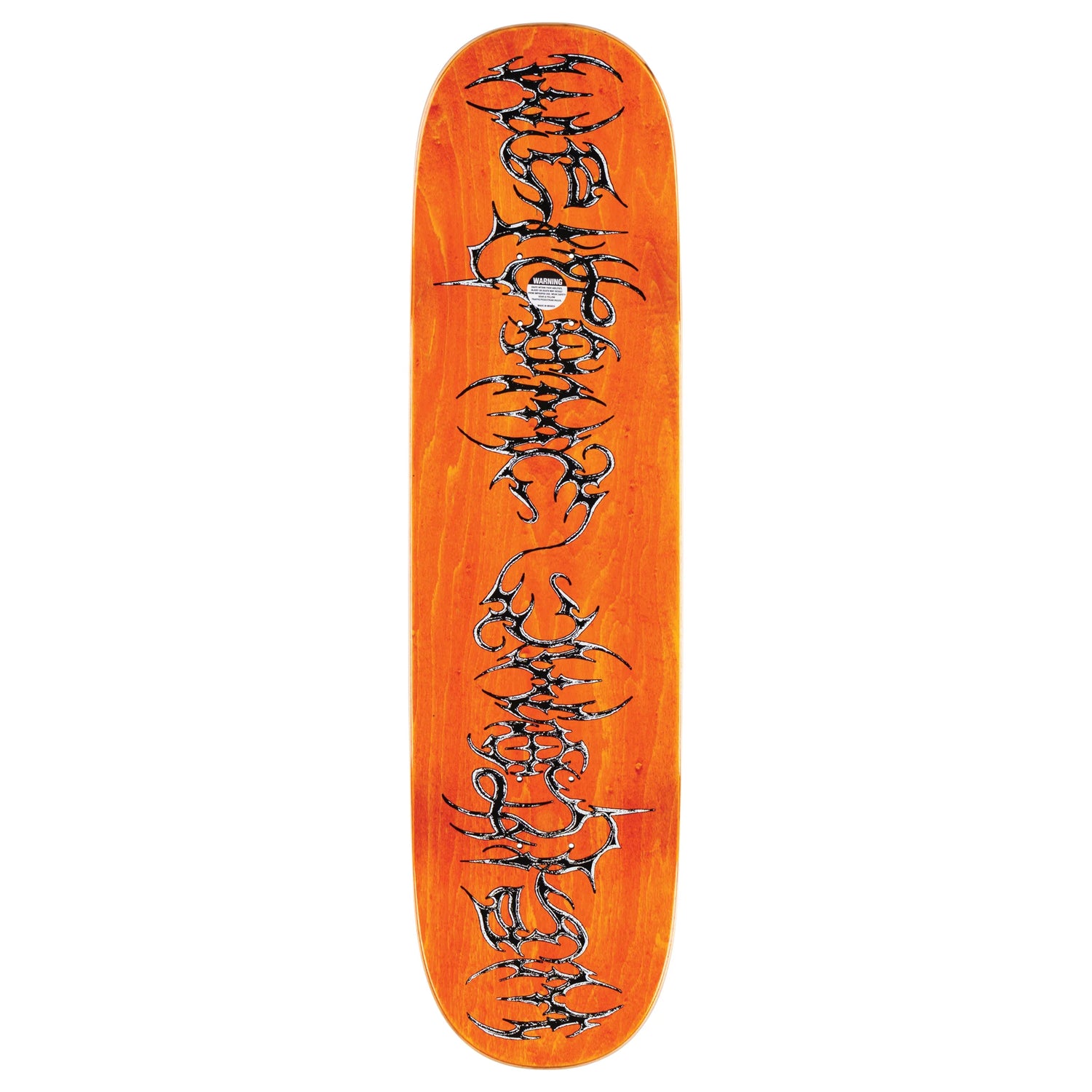 Orange skateboard deck with black tribal design on a white background