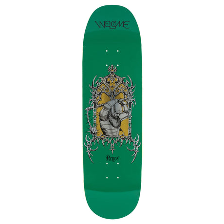 Green skateboard deck with a central graphic design on a white background