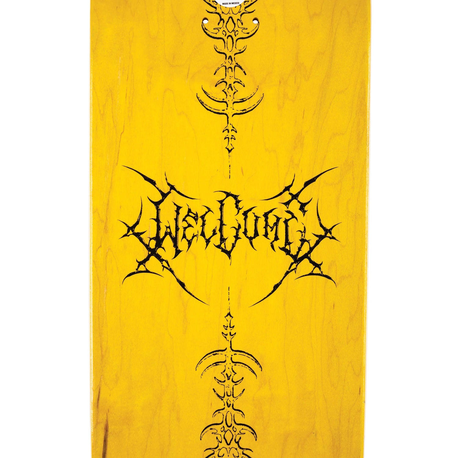 Yellow skateboard deck with black tribal design and text on a white background