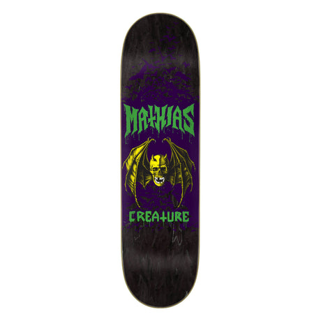 Skateboard deck with 'Maxxias' and 'Creature' branding on a black background