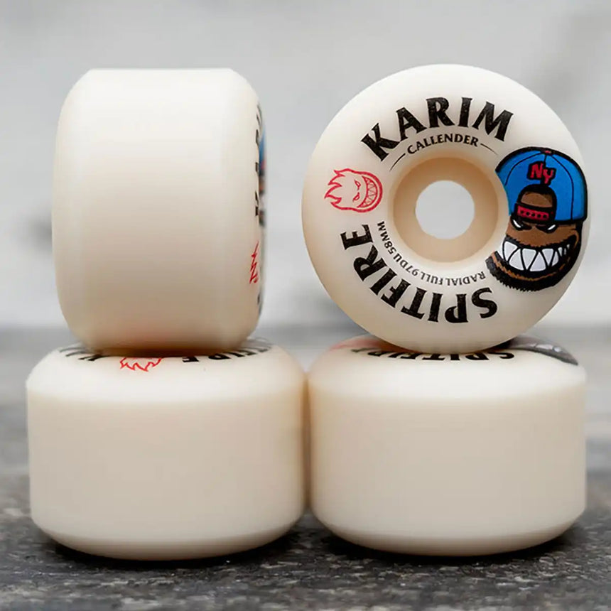 Skateboard wheels with visible branding on a gray background