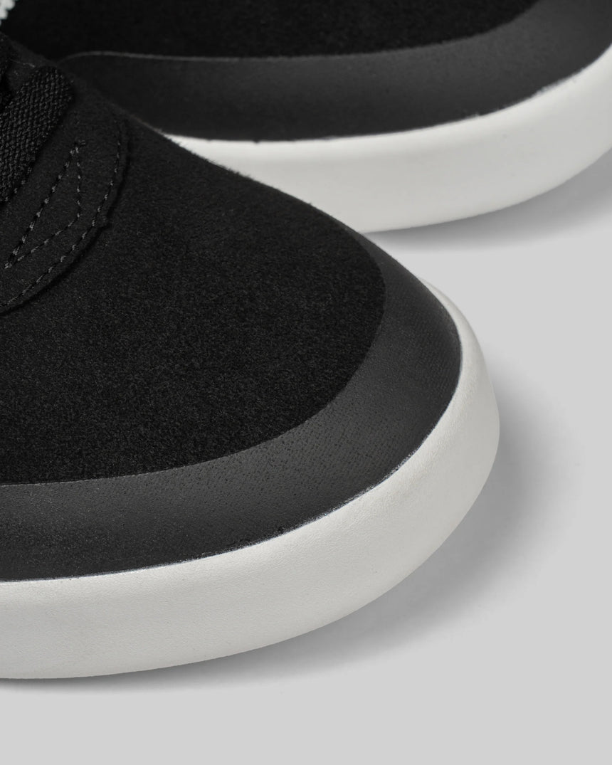 Warsaw Versus Black/White Shoe