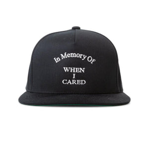 Money Ruins Everything Snapback Hat in Black Color Front View with In Memory of When I Cared woven on the front