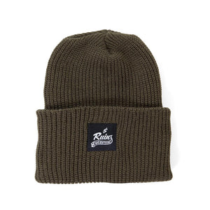 Money Ruins Everything Logo Woven Label Shoreman Beanie in Olive